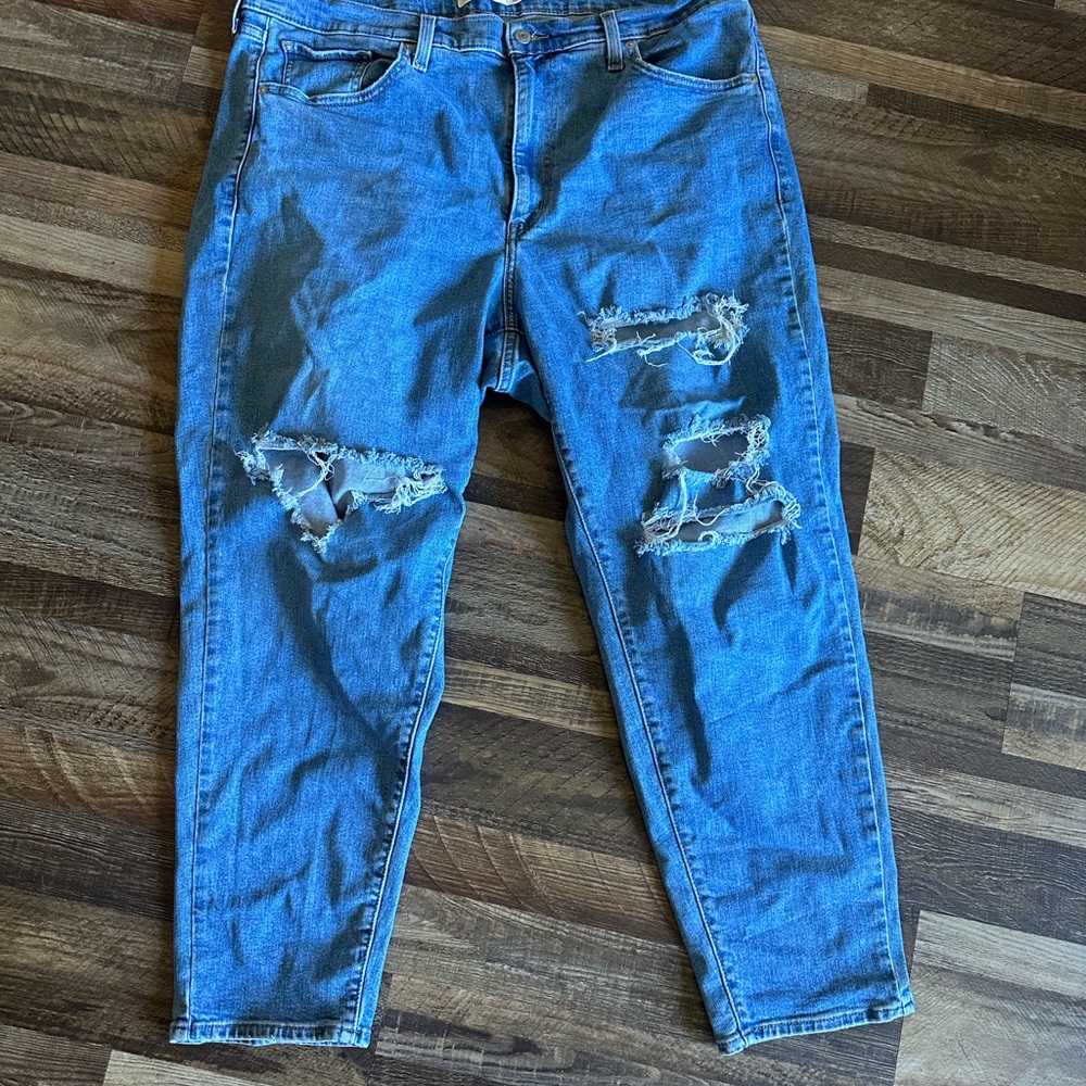 Distressed Levi Blue Jeans for women